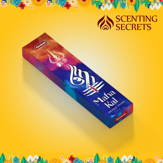 A box of Mahakal Premium Incense sticks by Sandesh Agarbathi Co with branding and floral patterns on the packaging.