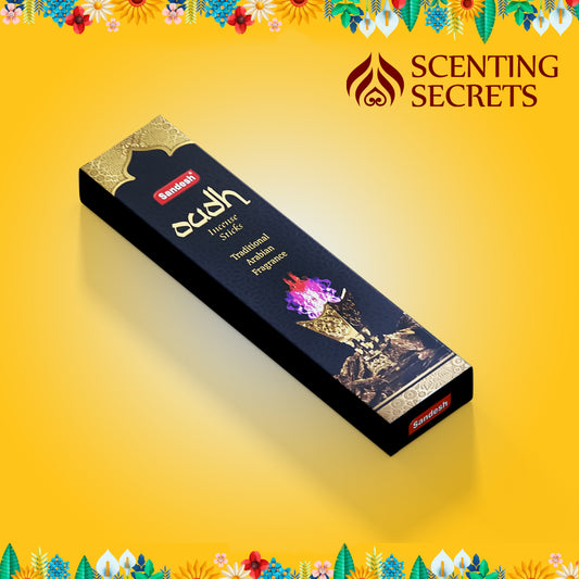 A box of Sandesh Agarbathi Co. Oudh Premium Incense sticks with a floral and incense design on the packaging.